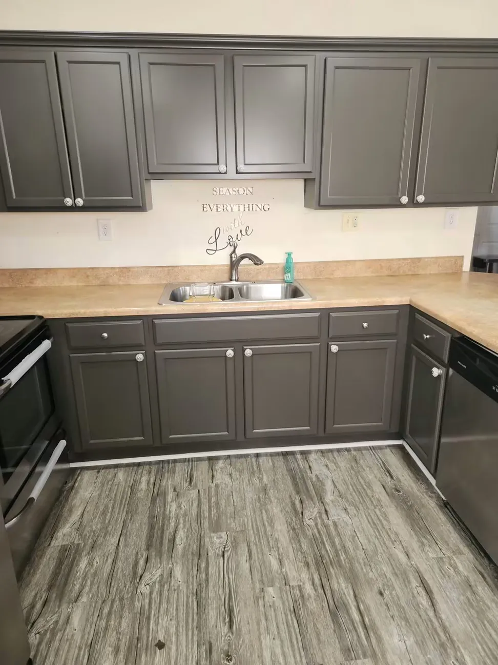 Cherry kitchen cabinets refinished in slate gray, the original doors, boxes and countertop all kept